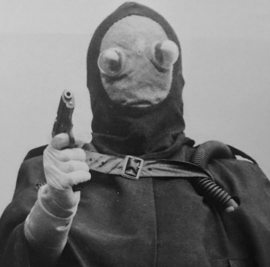 an image of the masked villain from Fellowship of the Frog